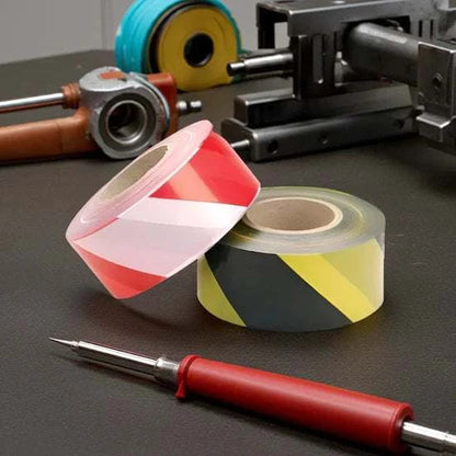 Adhesive hazard warning tape with high-visibility chevron pattern made from PVC film and rubber