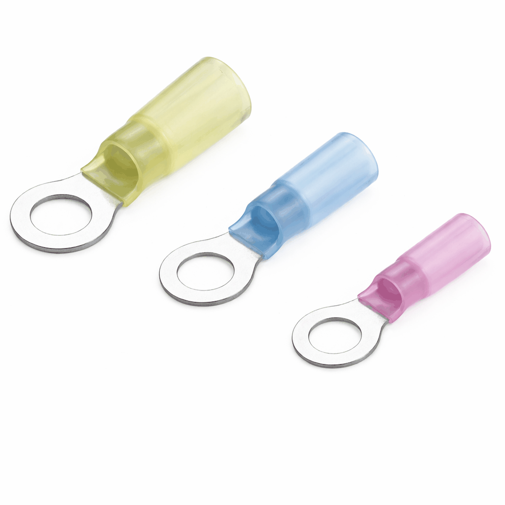 Close-up of heat shrink ring terminals with copper conductor and heat shrink insulation for sealed electrical connections