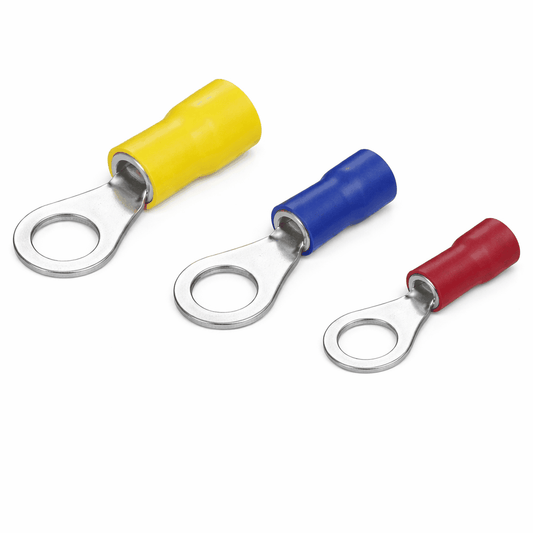 Close-up of insulated copper ring terminals with vinyl insulation and tin plating for secure electrical connections